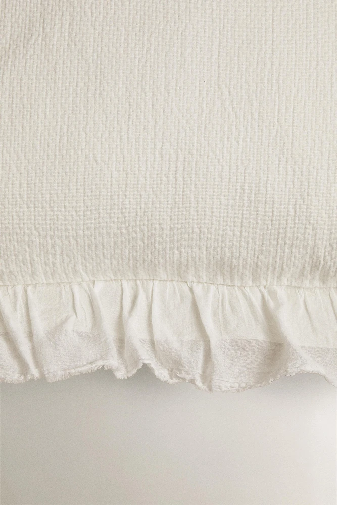 HOUSSE DE COUSSIN TEXTURE VOLANT