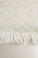 HOUSSE DE COUSSIN TEXTURE VOLANT