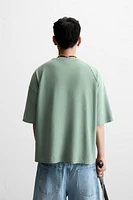 T-SHIRT EN MAILLE IMPRIMÉ DÉLAVÉ