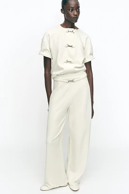 PANTALON LARGE À BOUCLE