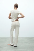 PANTALON EN MAILLE POINTELLE