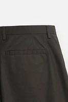 WAXED EFFECT SUIT PANTS