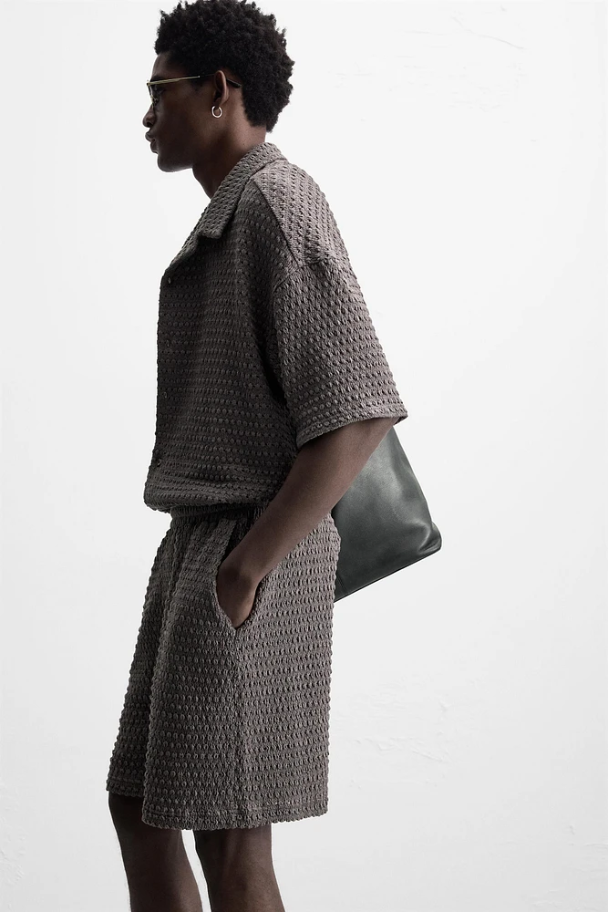 IRREGULAR TEXTURED BERMUDA SHORTS