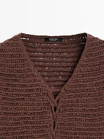 Veste sans manches lacée en crochet de coton mélangé