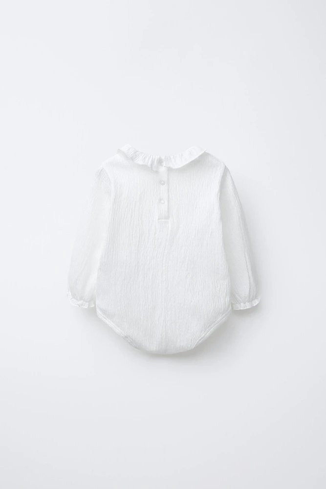 TEXTURED BODYSUIT
