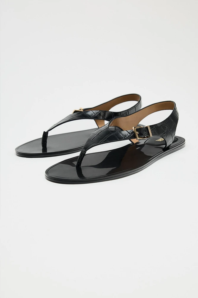 EMBOSSED FLAT SANDALS