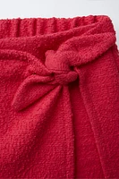 TEXTURED TIE SKORT
