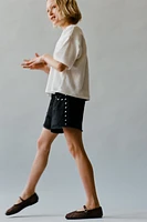 RIPPED DENIM SHORTS WITH STUDS