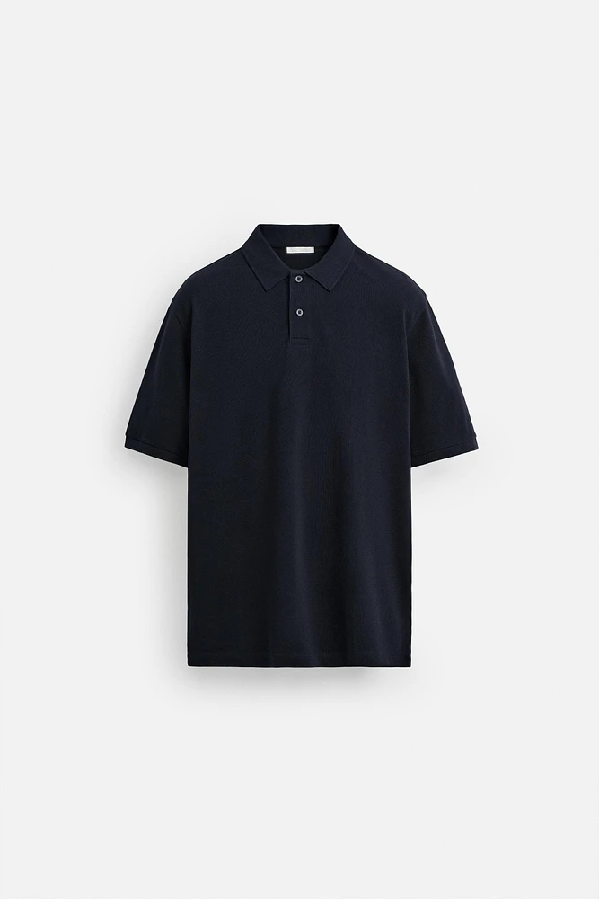 POLO DÉLAVÉ STRUCTURÉ EN PIQUÉ