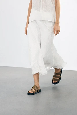 FLAT BUCKLE SUEDE SANDALS