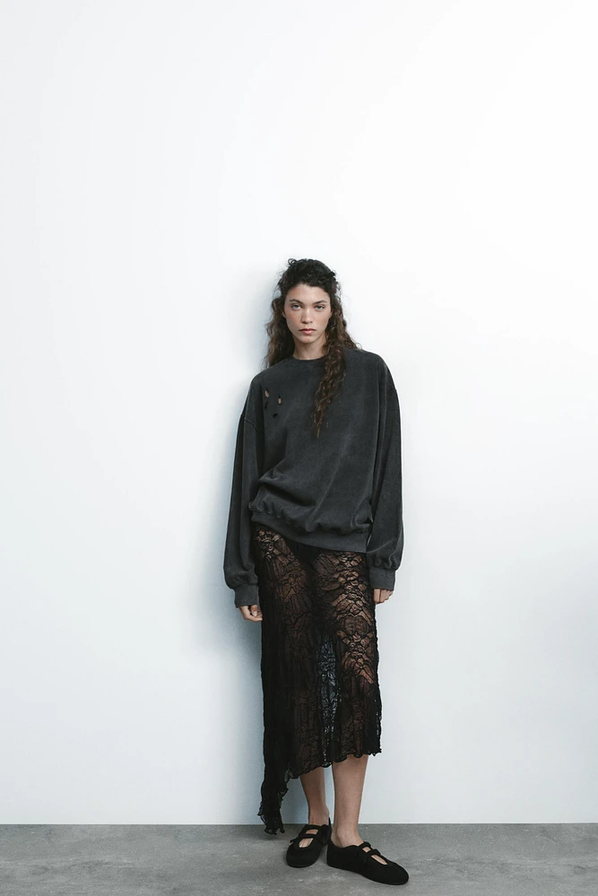 JUPE ASYMÉTRIQUE AVEC DENTELLE