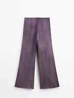 Flowing flared satin trousers