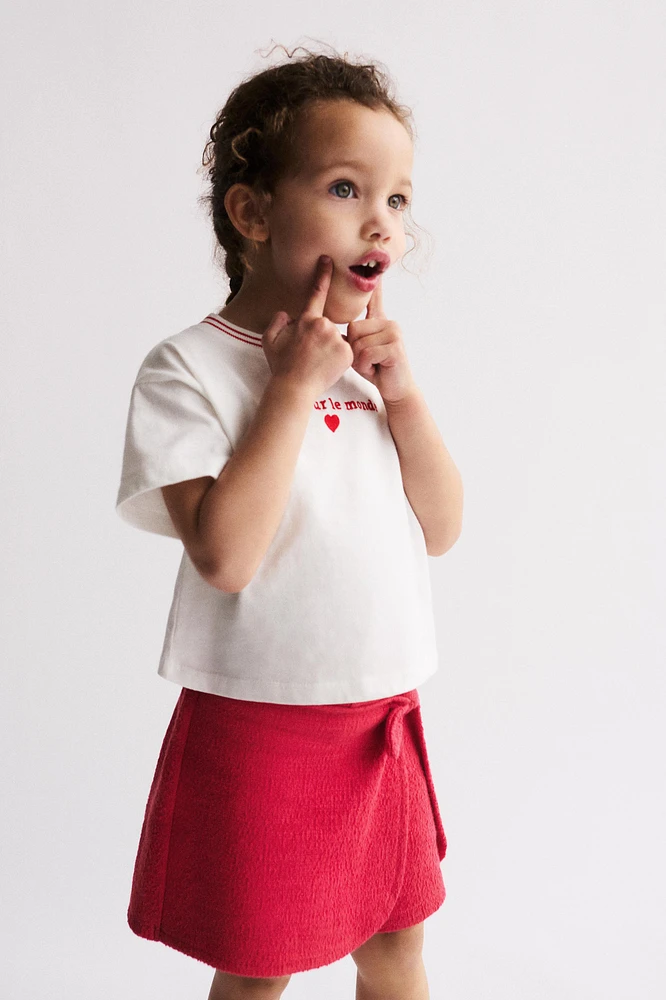 TEXTURED TIE SKORT
