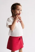 TEXTURED TIE SKORT
