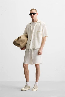 TEXTURED EMBROIDERED SHORTS