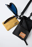 MULTI-POCKET CROSSBODY BAG