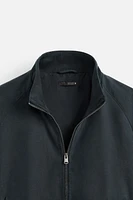 BLOUSON EFFET CIRÉ