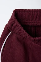 STRAIGHT PLUSH TEXT PANTS