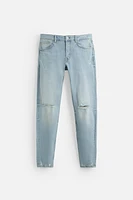RIPPED SKINNY JEANS