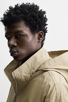 TECHNICAL PARKA WITH POCKETS