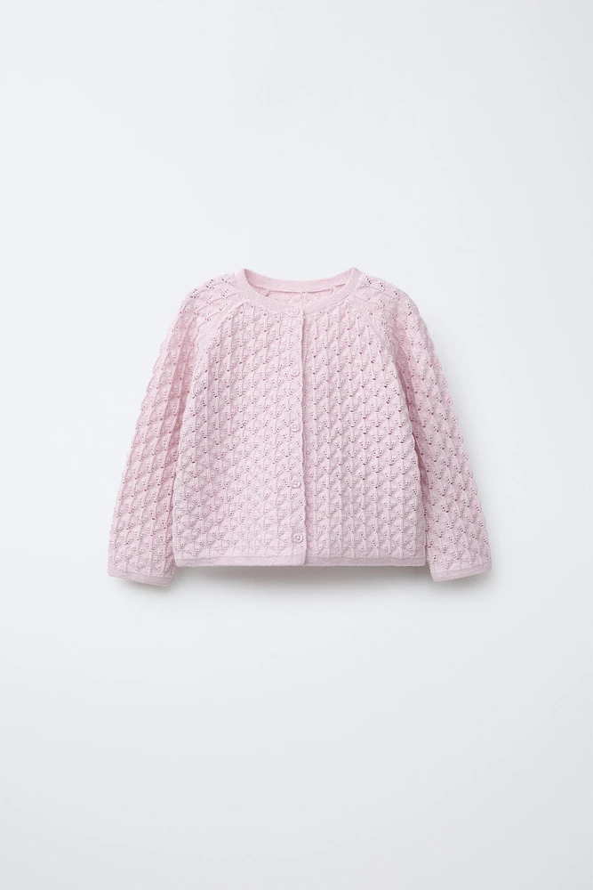 GILET EN MAILLE AJOURÉE