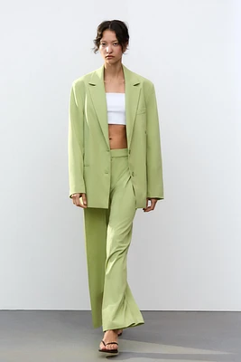 VESTE OVERSIZE MULTIPOSITIONS