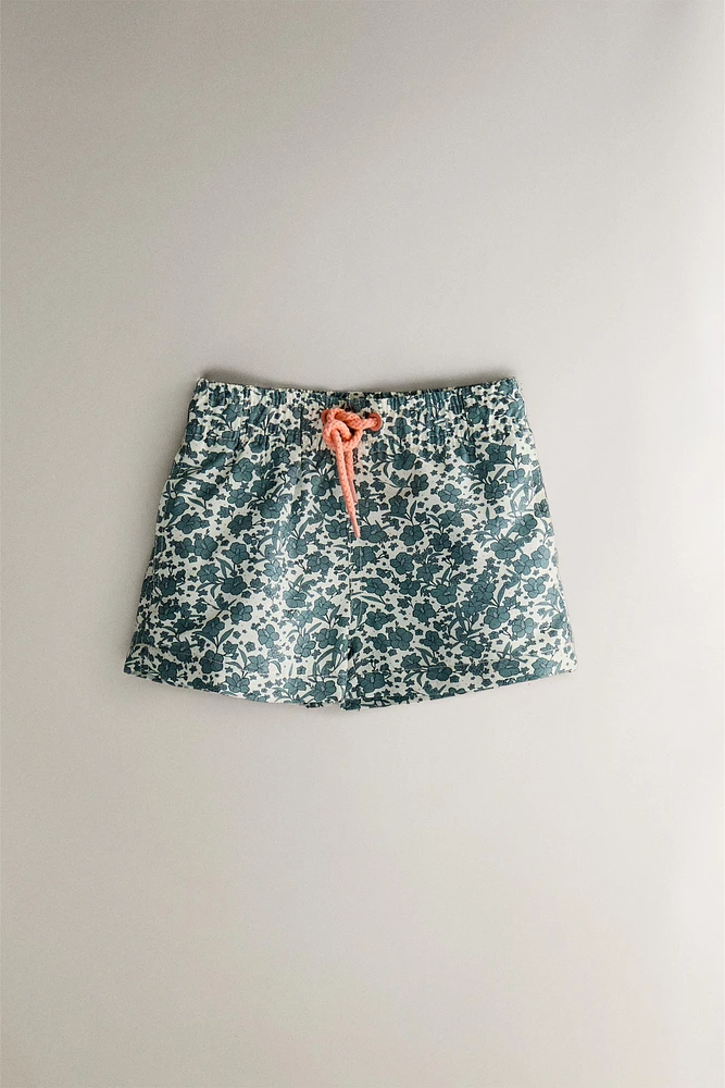 CHILDREN’S TROPICAL FLORAL BEACH SWIMSUIT
