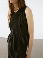 Flowing halter top with gathered detail