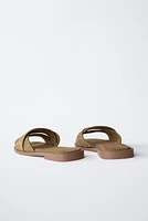 SUEDE CROSS STRAP FLAT SANDALS