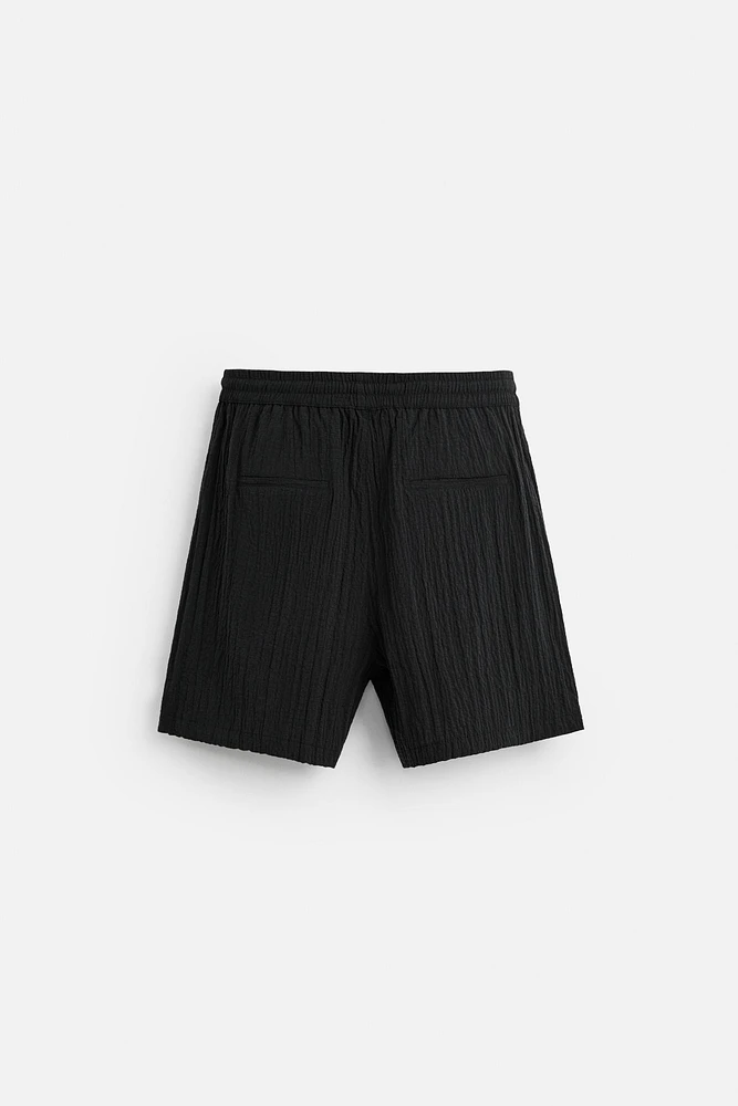 WRINKLED EFFECT JACQUARD BERMUDA SHORTS