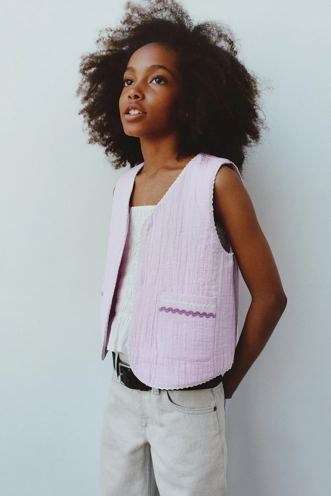 GILET TEXTURÉ ONDULINE