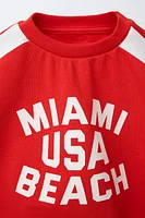 STRIPED TEXT SWEATSHIRT