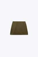TWILL BUCKLE MINI SKIRT