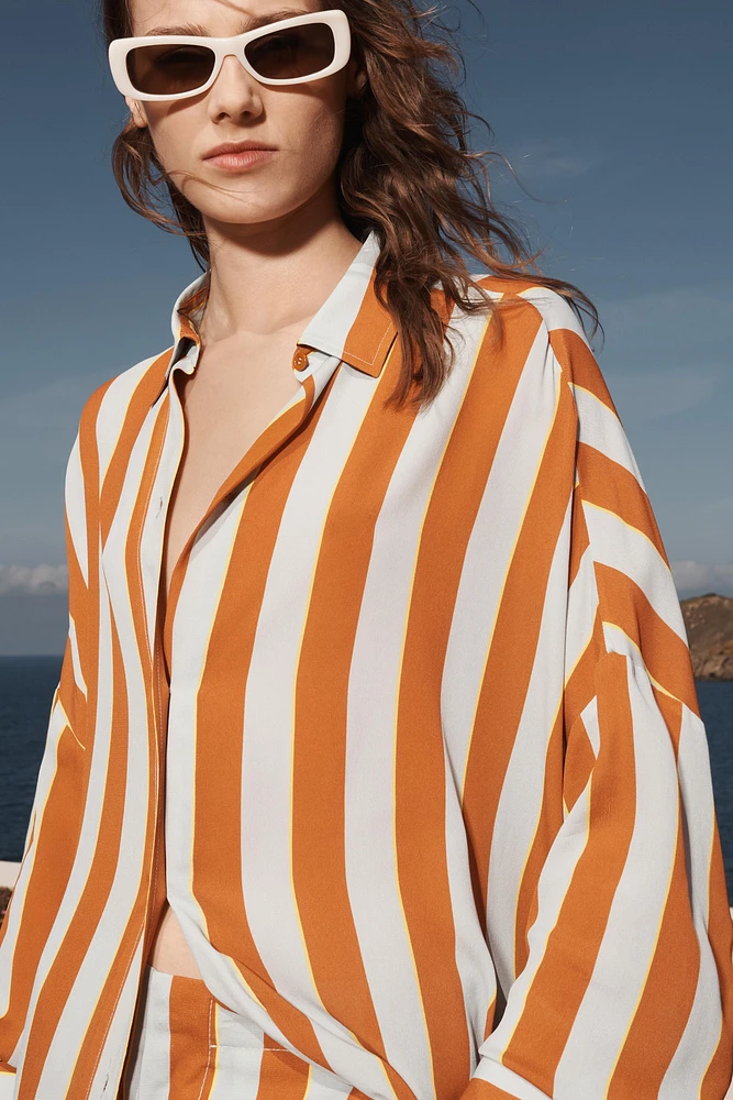 CHEMISE OVERSIZE RAYURES ÉDITION LIMITÉE