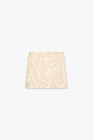 MINI JUPE À PAILLETTES