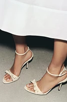 SANDALES À TALONS ET LACET