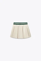 BOX PLEAT KNIT MINI SKIRT