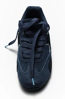 BASKETS EN CUIR