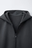 GILET À CAPUCHE SPORT