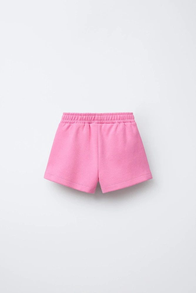 BERMUDA INTERLOCK POCHES CŒUR