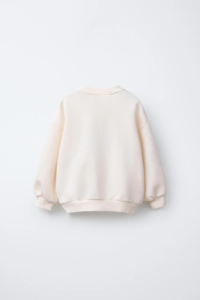 MINNIE MOUSE © DISNEY PATCH SWEATSHIRT