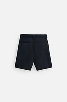 PLEATED BELT BERMUDA SHORTS