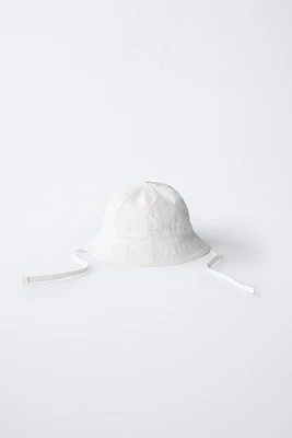 CAP WITH LABEL