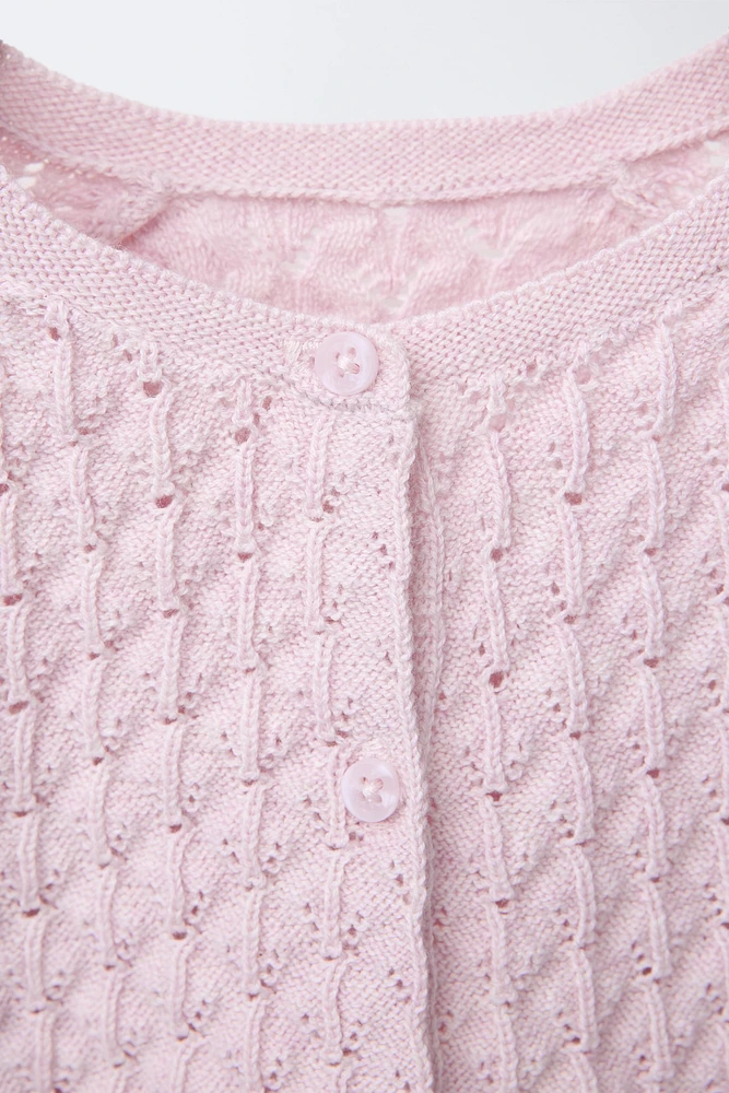 GILET EN MAILLE AJOURÉE