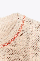 TOP EN MAILLE MANCHES COURTES