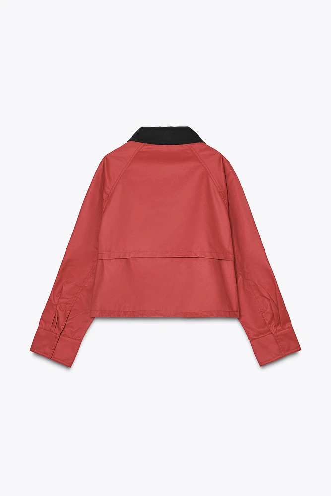 VESTE CIRÉE À COL EN MATIÈRES VARIÉES