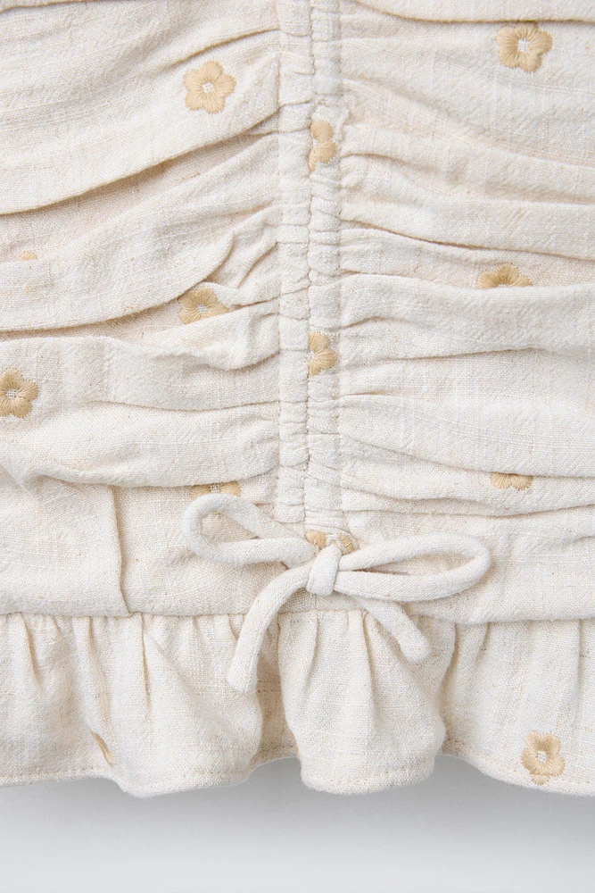 LINEN EMBROIDERED FLOWER RUCHED TOP