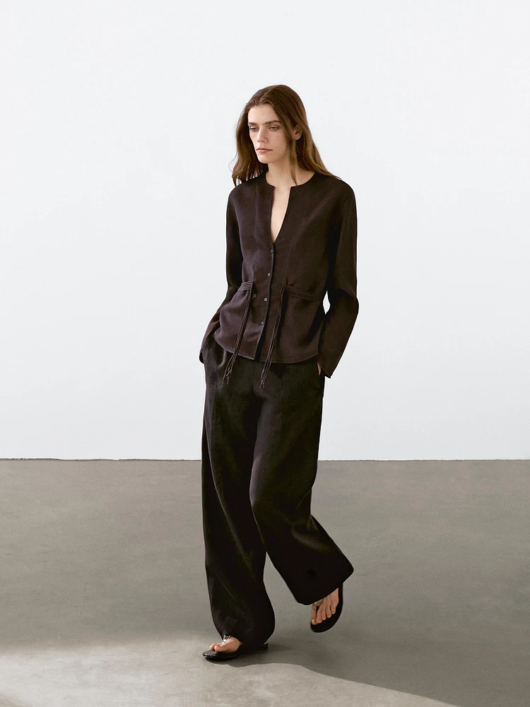 Flowing shirt with cord details