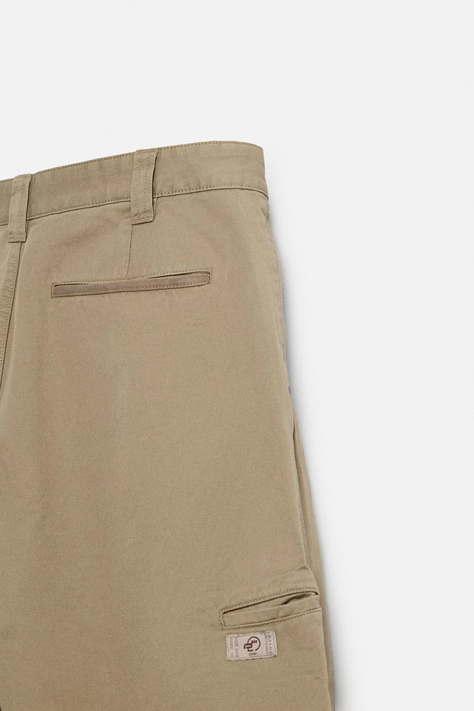 PANTALON RELAXED FIT À PLIS
