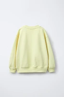 SWEAT FLEUR EN RELIEF